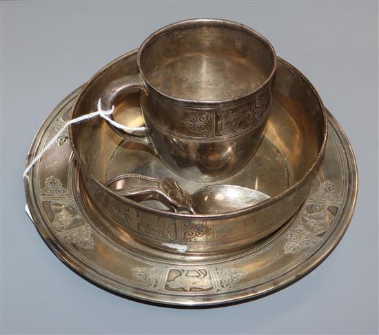 An early 20th century Tiffany & Co sterling three piece christening set, comprising a bowl on stand and mug and a similar spoon.